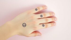 minimal peace sign tattoos